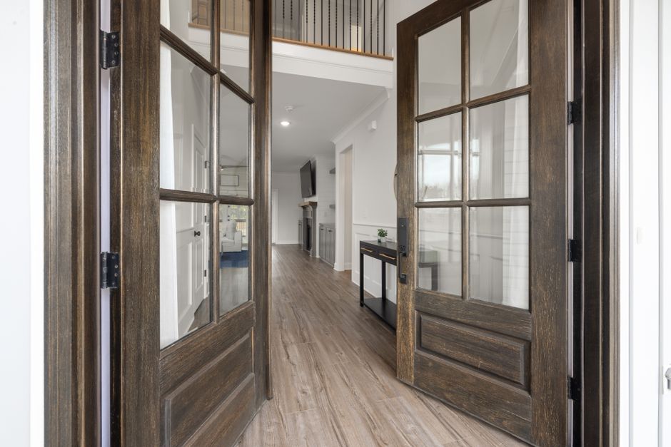 Contemporary glass panel front door letting in natural light